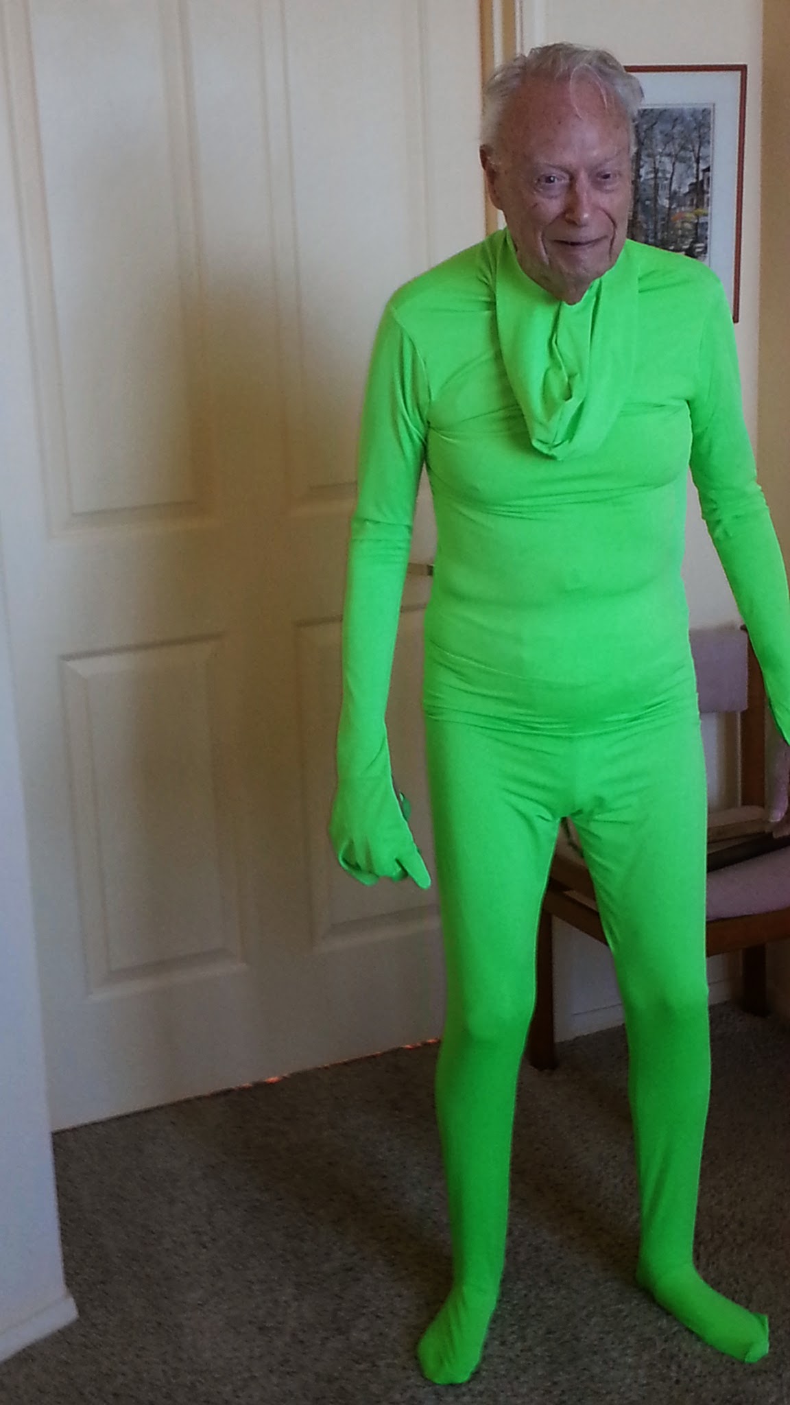 Dad bought a green suit so he could edit himself out of video sequences
